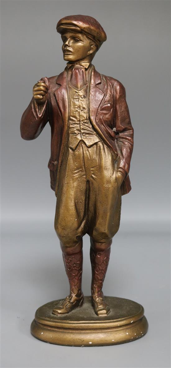A signed plaster figure of a gent